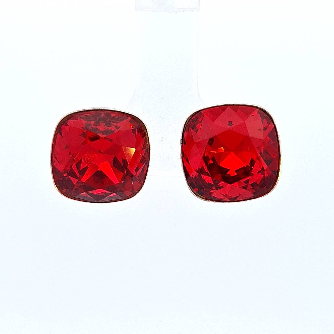 Silver Cushion Stud Earrings with Light Siam square Austrian crystal, a fiery red symbolising passion, courage, and the strength within every woman.