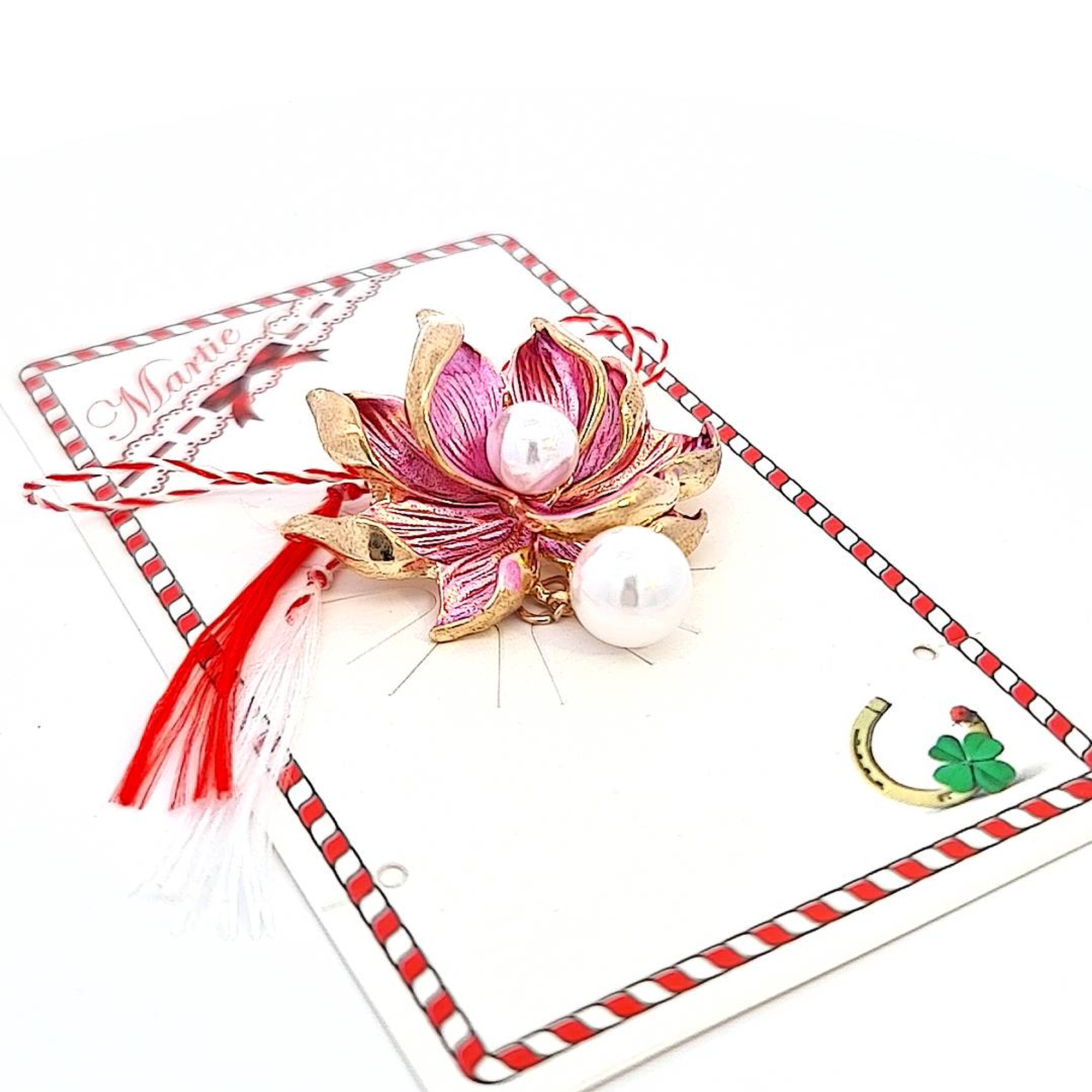 Blossom of Hope Mărțișor Brooch presented alongside its storytelling card, detailing the ancient spring tradition of Mărțișor.