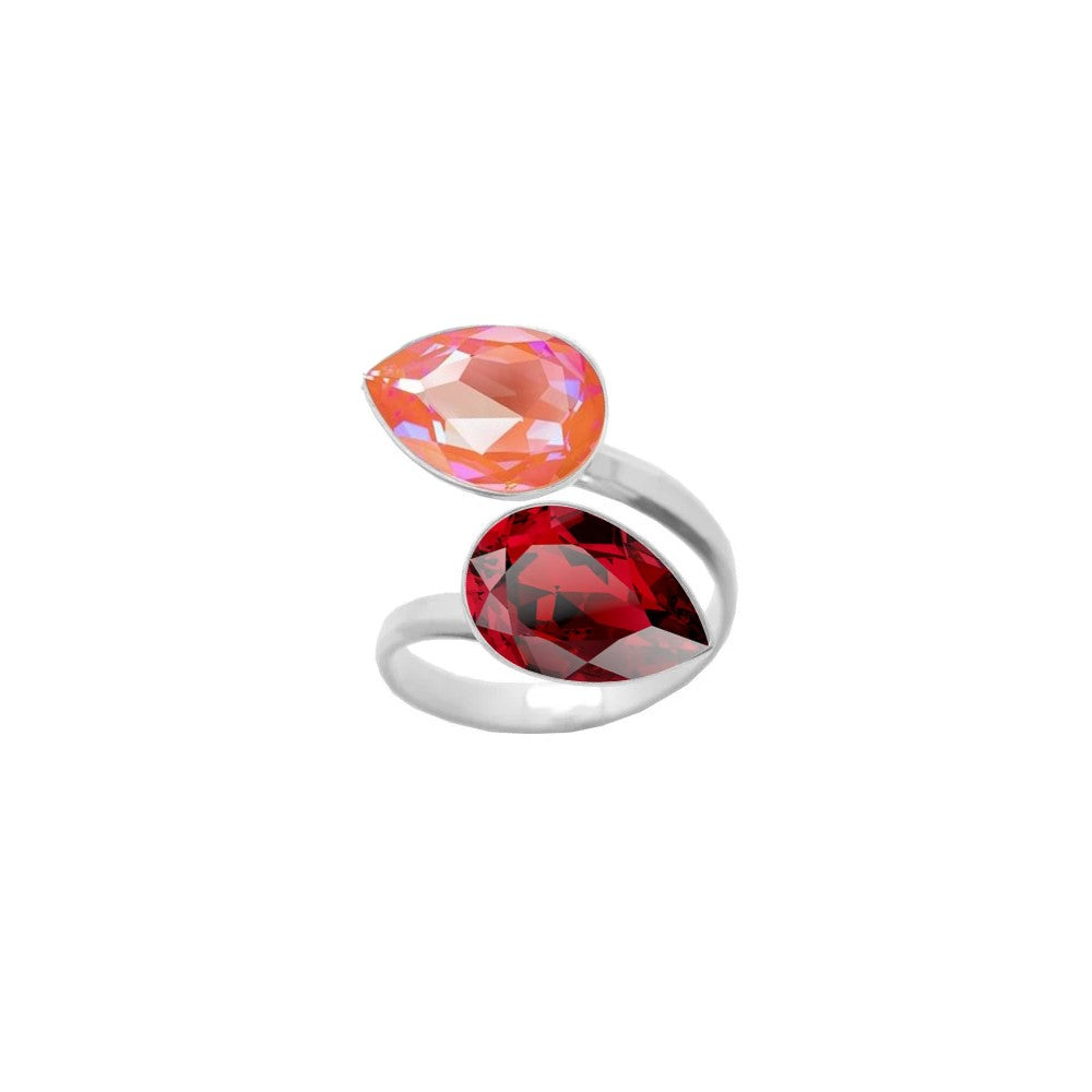 A vibrant dual crystal ring for women, crafted from 925 Sterling silver with Orange Glow Delite and Scarlet Red pear-cut crystals, wrapped delicately around the finger, handmade by Magpie Gems in Ireland.