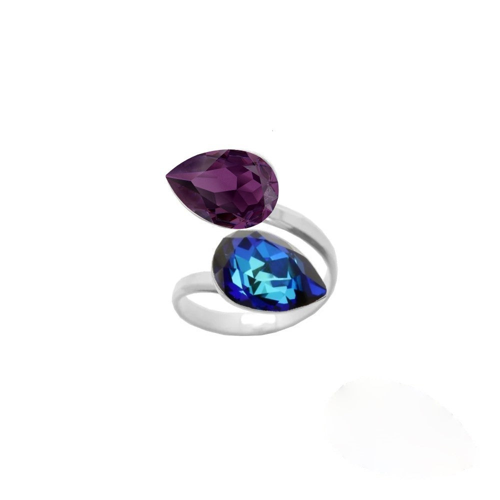 Handmade in Ireland, this 925 Sterling silver ring features a wrap-around design with two pear-cut crystals in Bermuda Blue and Amethyst Purple, perfect for women who appreciate fine silver jewellery.