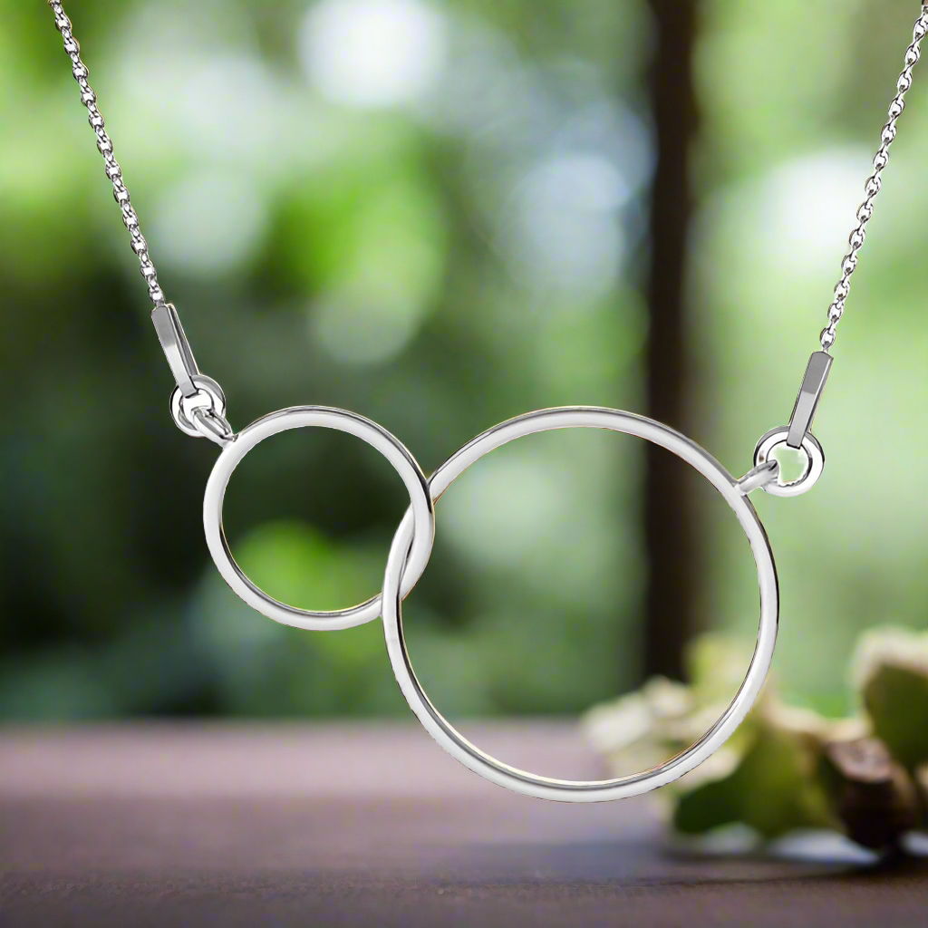 Elegant nickel-free sterling silver necklace featuring two interlocking circles, perfect for women.