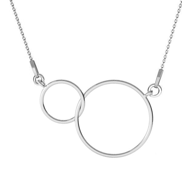 The Golden Moments Double Hoop Necklace features two overlapping circles in elegant sterling silver, representing the interconnectedness of two lives and the shared experiences that have brought them closer together.