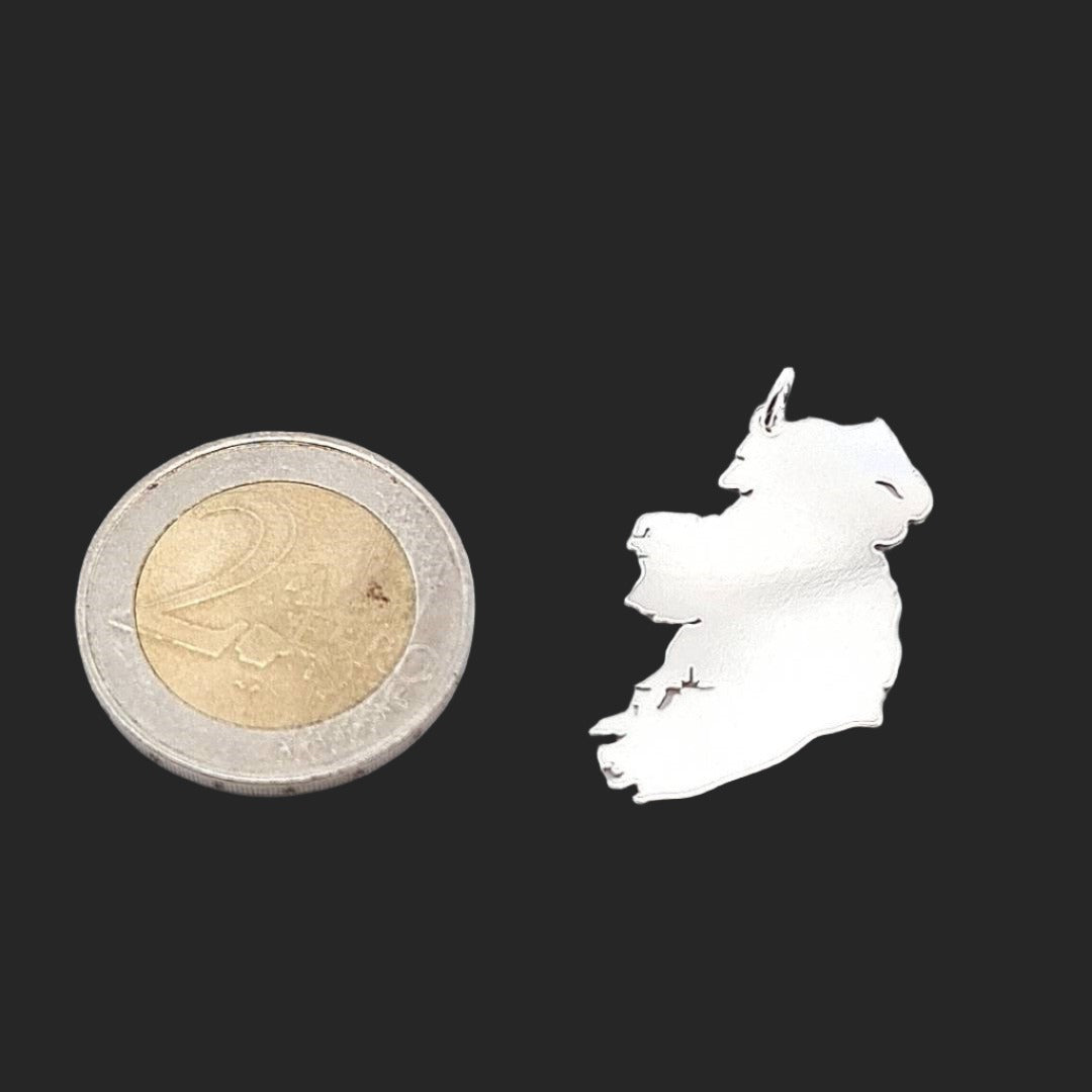 ÉIRE - Ireland's Heartbeat - 925 Sterling Silver Map Pendant next to a 2€ Coin for Size Comparison