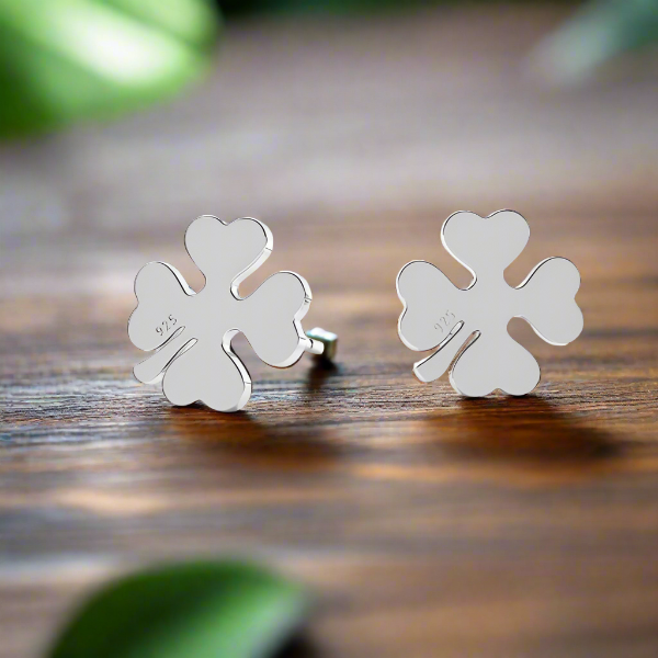 Close-up of Four-Leaf Clover Silver Stud Earrings showcasing the detailed design, by Magpie Gems in Ireland