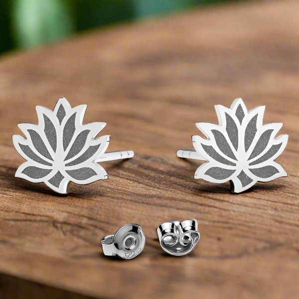 Small stud earrings in nickel-free sterling silver with a lotus flower design for girls, teens, and adult women by Magpie Gems in Ireland