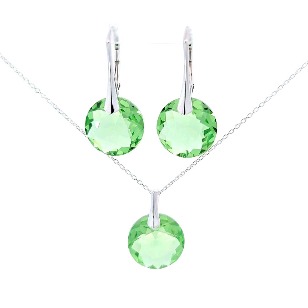 Peridot August Leo Birthstone Jewellery Set featuring a vibrant green Austrian crystal pendant and matching drop earrings in sterling silver. Perfect for August birthdays or Leo zodiac celebrations.