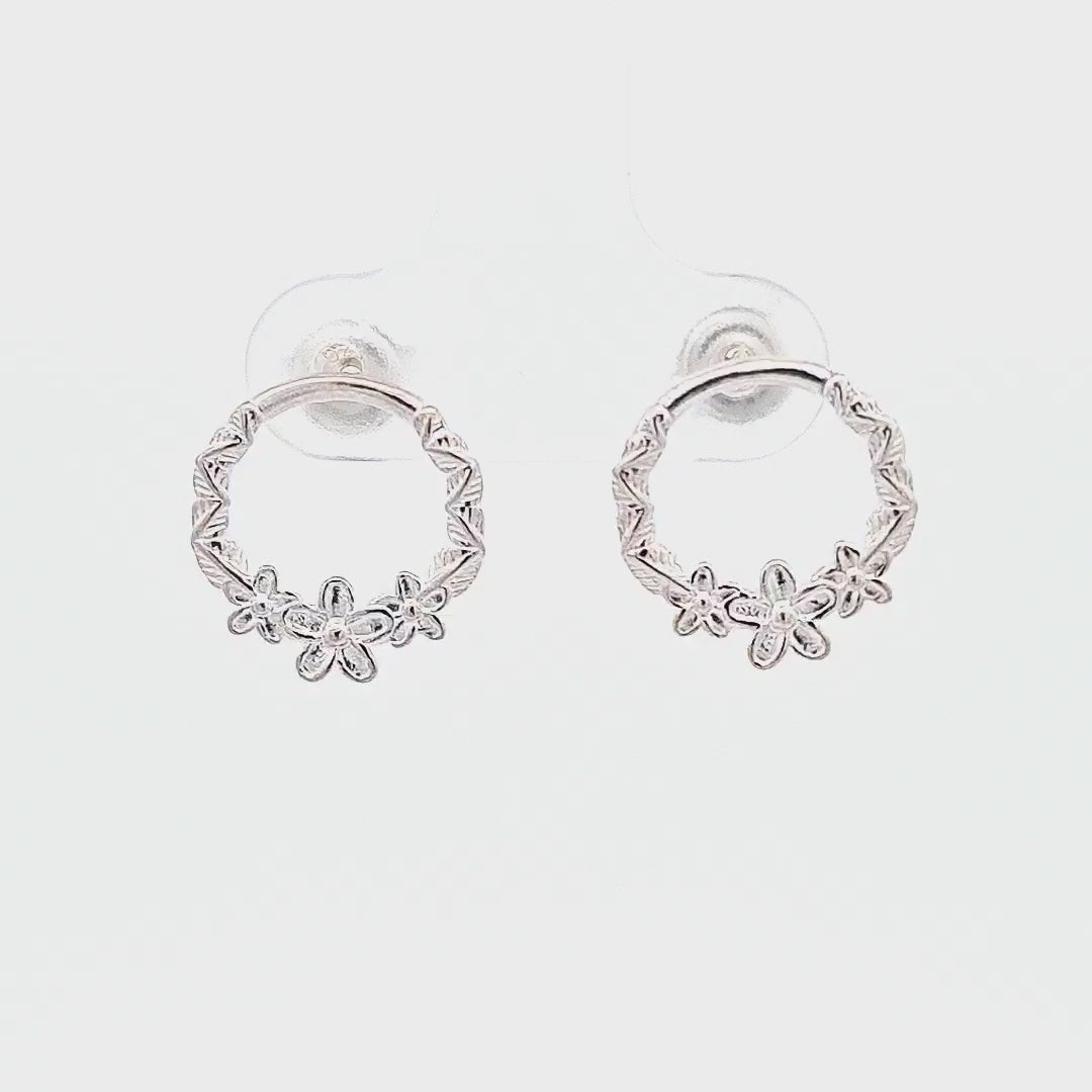 Video shows a detailed view of the Nature's Blossom Sterling Silver Earstuds, highlighting the exquisite Forget-Me-Knot floral design and their elegance. The video captures the earrings from various angles to showcase their beauty and craftsmanship. It ends with a close-up shot of the earrings, allowing viewers to appreciate the intricate details. Perfect for those who seek nature-inspired jewelry with timeless appeal.