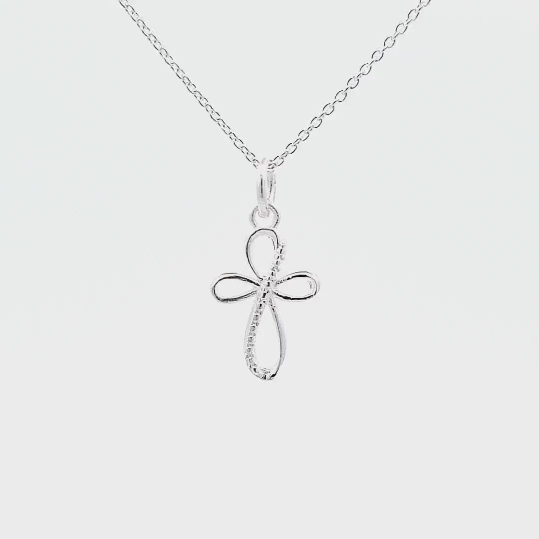 Video Showcasing an Elegant Infinity Silver Cross Necklace with Infinity Style Pendant, perfect for a daughter, granddaughter or goddaughter Christening, First Communion or Confirmation