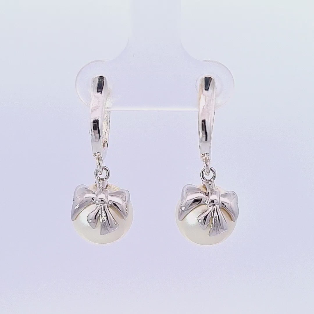 Video of the Irish Made Sterling Silver Bow Huggies with White Pearl Drop Crystals