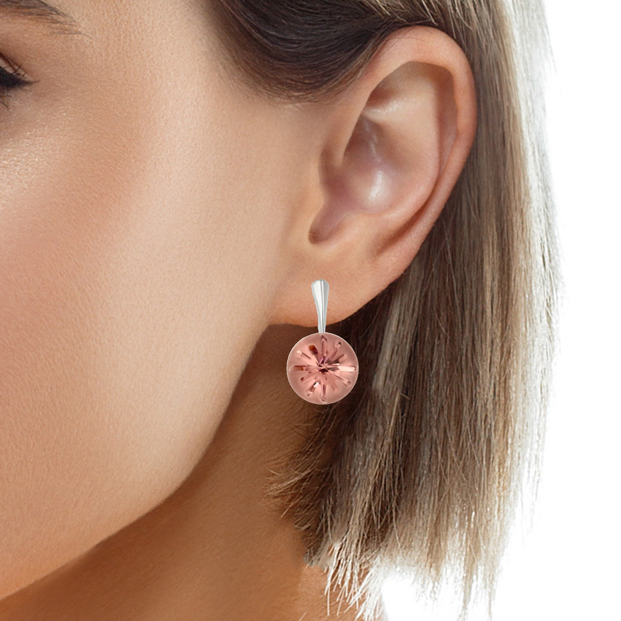 Woman Radiating Elegance with Seaside Rose Drop Earrings in Sterling Silver