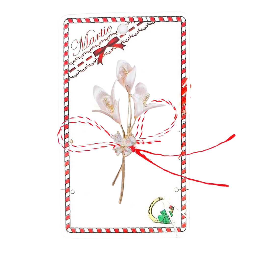 Soft Pink Lily Bouquet Martisor Brooch displayed on a decorative card with traditional red and white detailing, featuring elegant pink lilies, golden accents, a sparkling crystal bow, and the iconic red and white Martisor bow, symbolising spring and renewal.