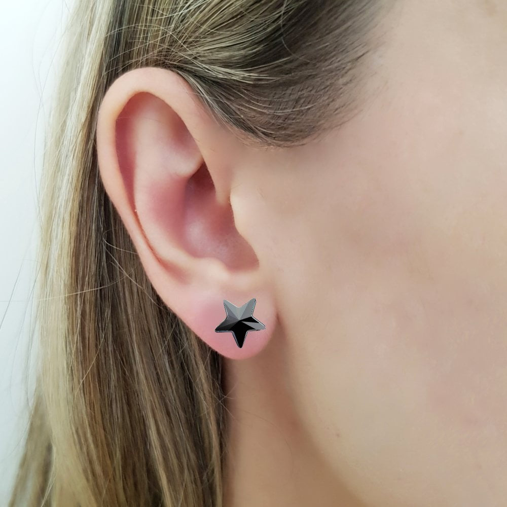 Model wearing Jet Black Star Crystal Stud Earrings in Sterling Silver for girls and women