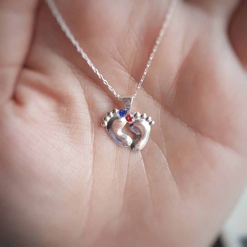 Sterling silver baby loss necklace with baby feet charm pendant and blue and red Austrian crystals for twins or multiples