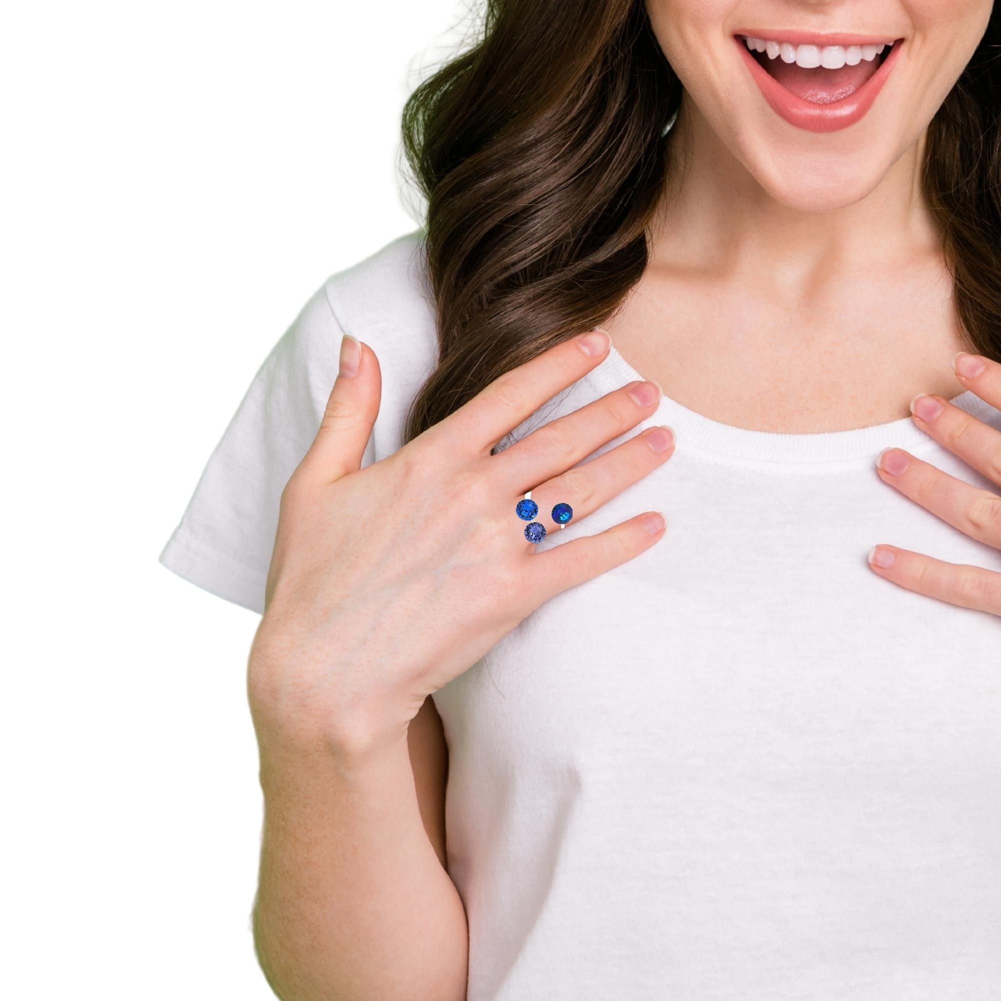 Joyful reveal of the Magpie Gems Triad Treasure Cluster Ring, highlighting its bold design and vivid crystals on an elegant hand