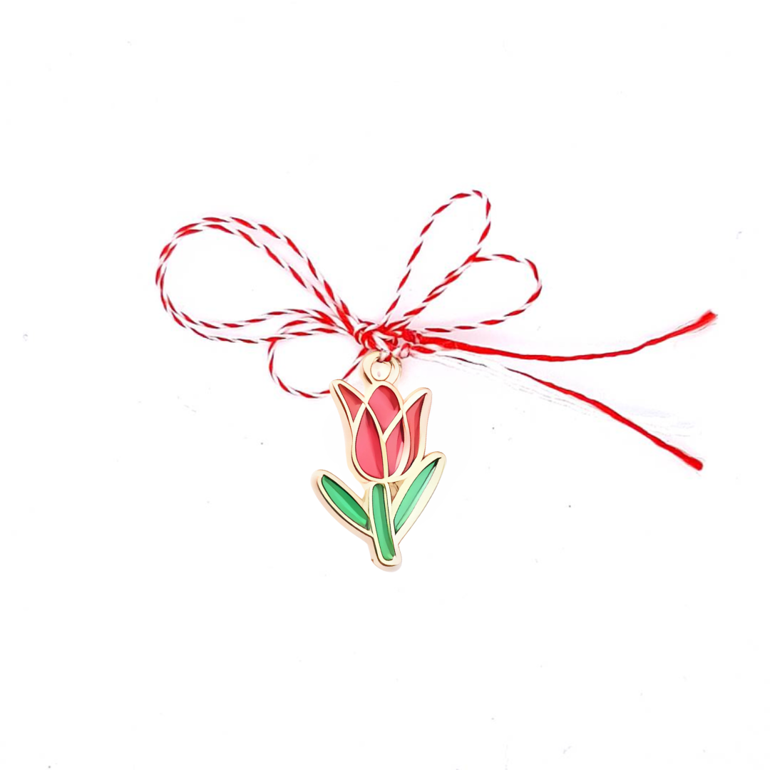 Tulip Martisor Charm Pendant on a Red and White bow with vibrant red and green enamelled tulip design and golden accents, perfect for celebrating the 1st of March traditions.