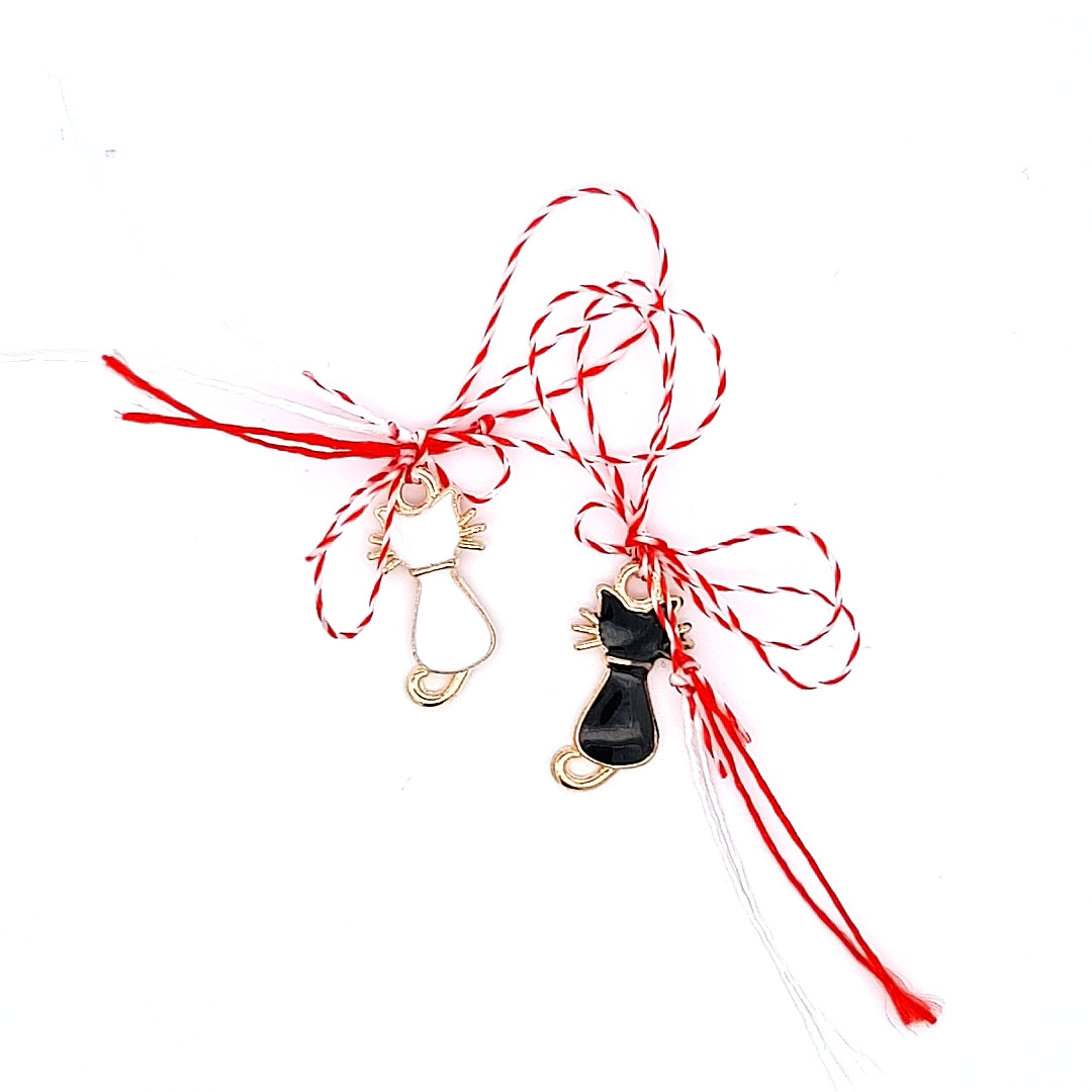 Black and White Cat Enamel Martisor on White Background, a whimsical and Sustainable Martisor for Spring