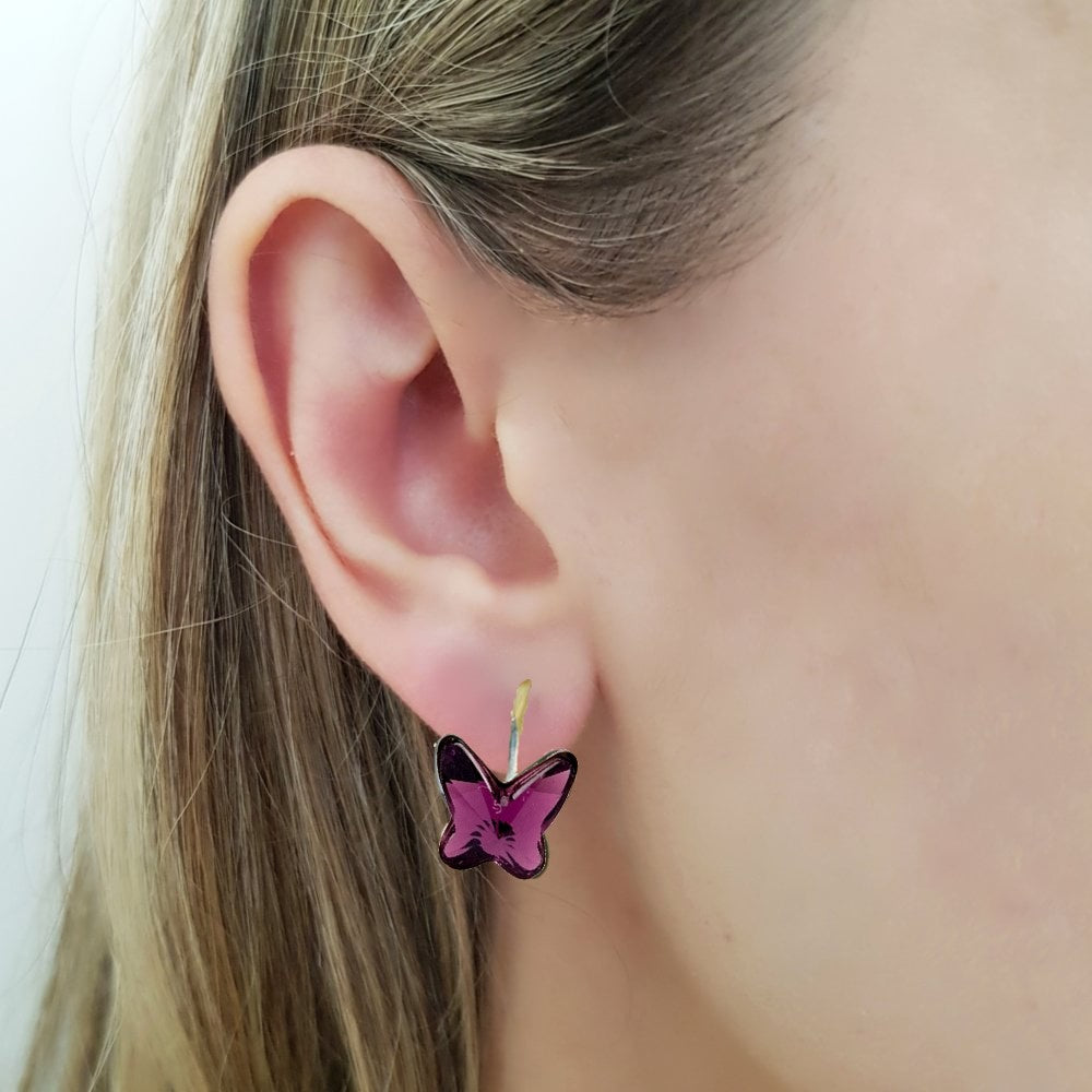 Model wearing Sterling Silver Butterfly Crystal Earrings with Amethyst Crystal for Teens and Adults