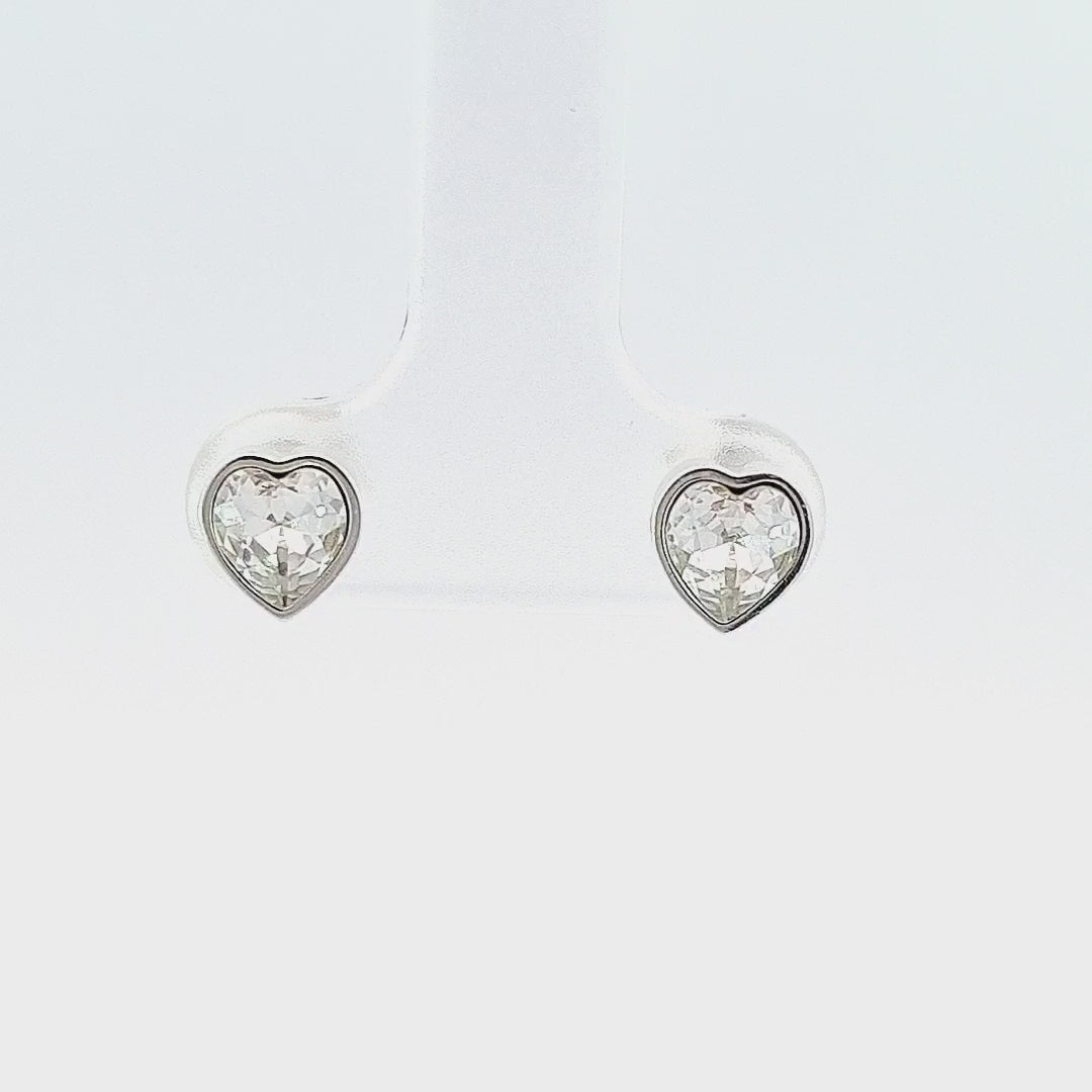 360-degree video view of Crystal Heart Stud Earrings in sterling silver, showing the secure post and butterfly closure.