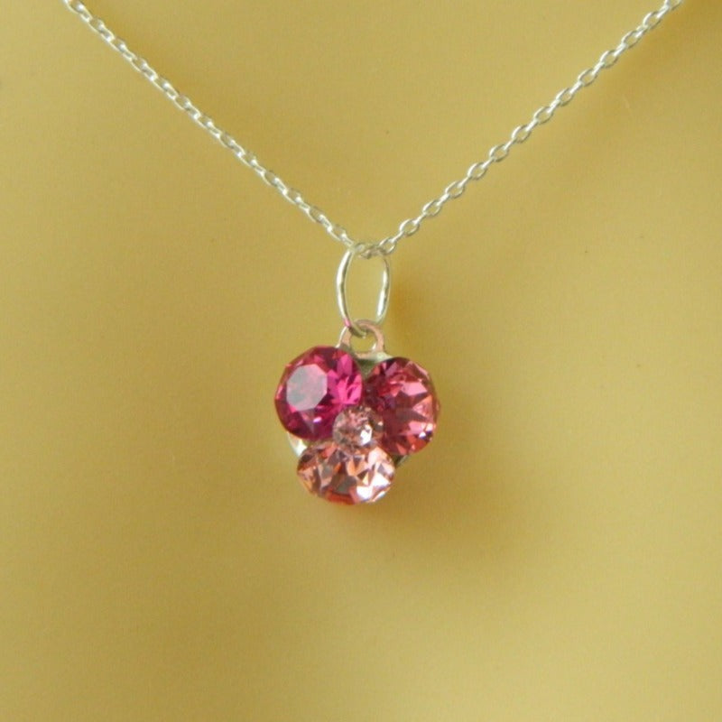 Close-up of Trio Crystal Cluster Pendant in Rose Pink, Fuchsia Pink, and Light Rose