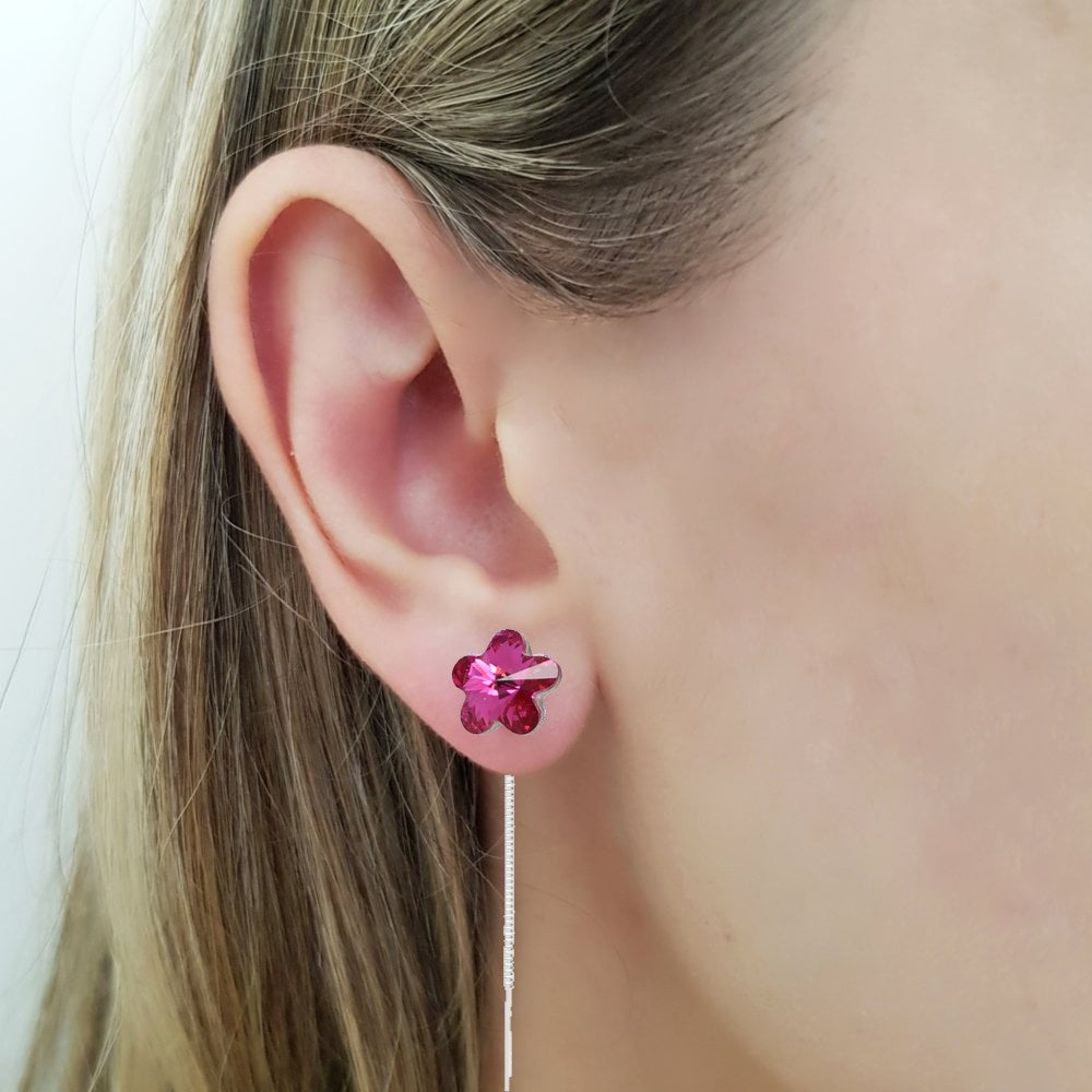 Young Woman wearing the Flower Crystal Silver Threader Earrings with Fuchsia pink and fine thread through ear chain.