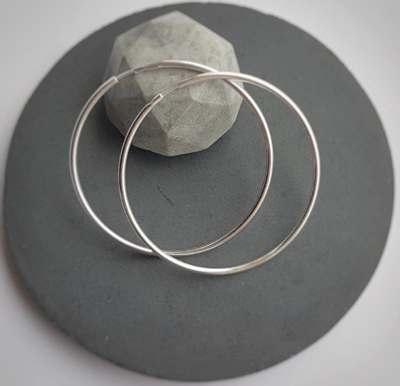 Nickel-free Sterling Silver Hoop Earrings on display, showing hypoallergenic design by Magpie Gems in Ireland