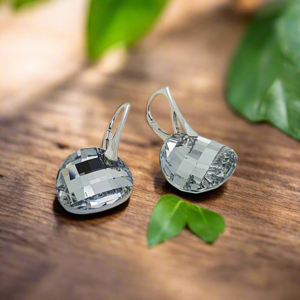 Front view of Austrian Crystal Twist Drop Earrings in Sterling Silver with Comet Argent Crystal