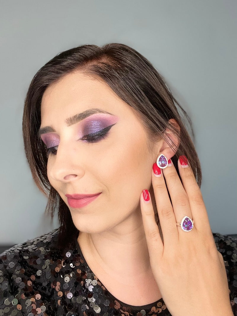 Woman Wearing a Rose Gold-Plated Sterling Silver Solitaire Ring with Austrian Pear Shaped Crystal